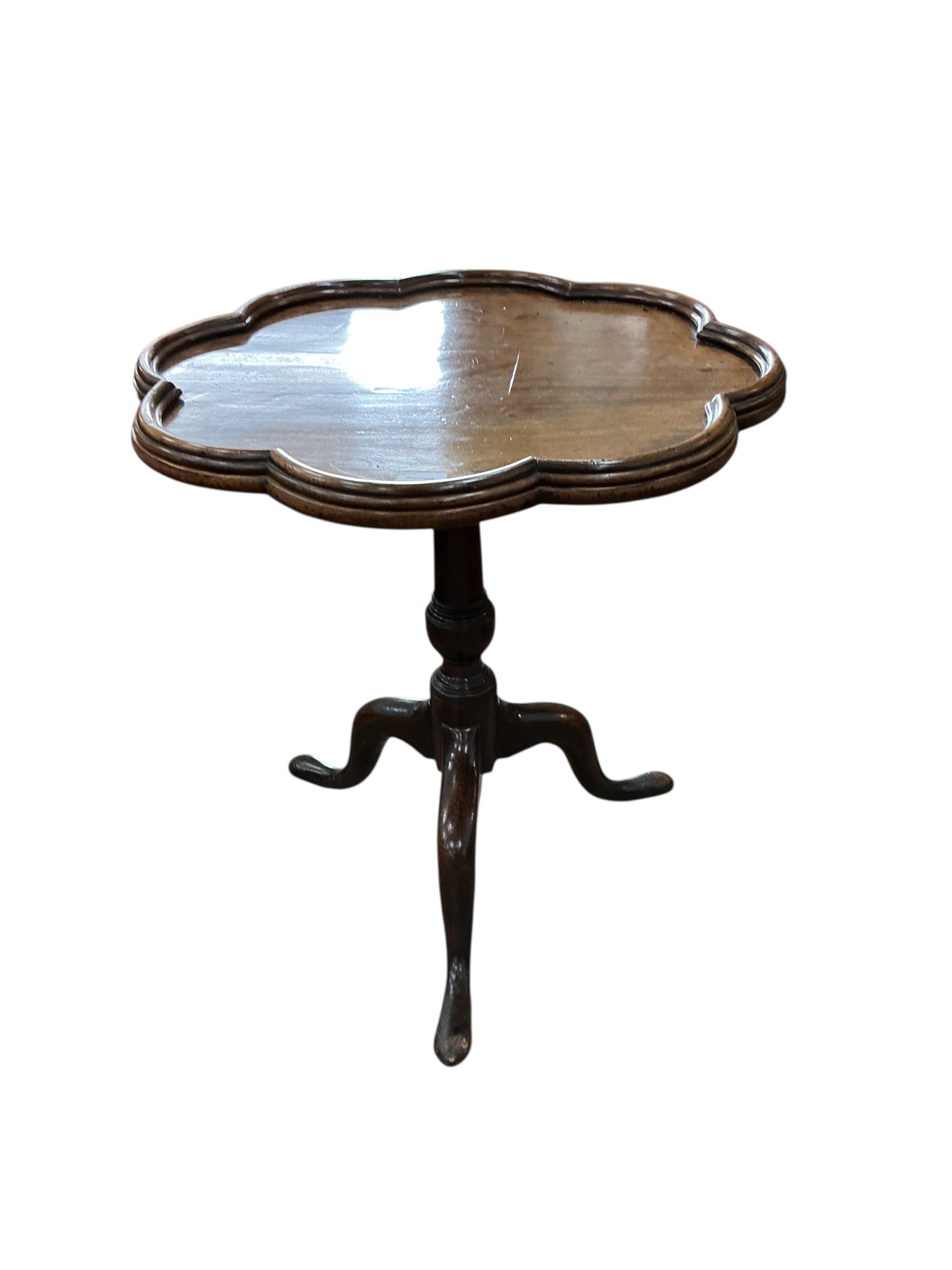 A George III mahogany circular tilt top tripod tea table, altered, diameter 64cm, height 69cm